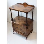 A fine figured walnut (with later painted figured highlights) pier cabinet: the galleried half-