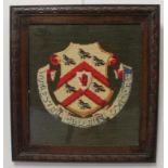An early 20th century gros point needlework of the arms of Worcester College, Oxford (47 x 43