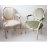 Two similar Louis XVI style (modern reproduction) French open-armed fauteuils: turned tapering