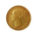 An 1871 gold sovereign (young head obverse and royal arms reverse).
