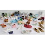 48 ornamental miniature shoes, clogs and boots (ceramic (31), glass (2), brass (4) and wood (5) to