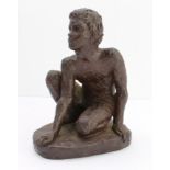 KARIN JONZEN (1914-1998): 'Young Boy Seated', cold-cast resin, monogrammed 'KJ', Heredities Ltd felt