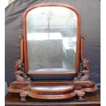 A large mid-19th century mahogany toilet mirror with original mirror plate (some minor distressing);
