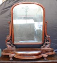 A large mid-19th century mahogany toilet mirror with original mirror plate (some minor distressing);