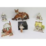 A group of six: 1. a fine Hutschenreuther (Germany) porcelain model of two foxes; 2. four Coalport