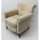 A good quality oatmeal upholstered armchair by Highly Sprung Ltd., in early 20th century style and