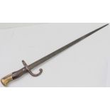 A French Model 1874 'Gras' bayonet: the back-edge of the 51 cm blade marked 'Mre. d'armes Tulle -
