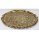 A large circular brass and enamel Benares style serving tray with pierced border: circular