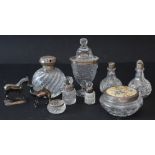 Six early 20th century silver-mounted cut glass dressing-table accessories and four other pieces: