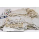 A large collection of vintage table linen: early to mid-20th century, including several sets of
