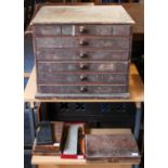 A  late 19th/early 20th century stained pine six-drawer engineer's chest containing precision