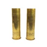 Trench art - a pair of First World War German brass shell cases: the bases stamped 'Rh.M.F. 1916