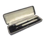 A George VI silver cased leverless fountain pen and propelling pencil set: William Manton,