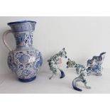 Four pieces of faience pottery: 1. two similar early 20th century French models of comical