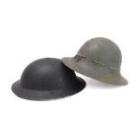 A WW2 British Home Front Air Raid Precautions (ARP) steel helmet: no stencils, with original black