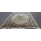 A Persian-style machine-made carpet: large central oval medallion with a further central