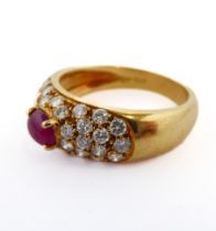A lady's 18-carat yellow gold (marked 750) dress ring centrally set with a horizontal ruby