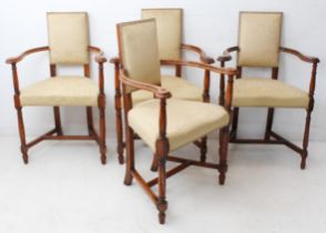 A set of four early 20th century stained beech and upholstered Caraquleures chairs: shaped moulded