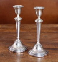 A pair of weighted modern silver table candlesticks in late 18th century style: maker's mark Adie