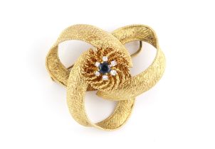A vintage 18ct yellow gold, sapphire and white stone brooch - 1960s-70s, the open, trefoil brooch
