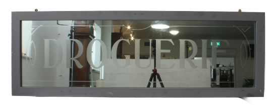 An Art Deco style French pharmacy mirror: the rectangular plate with etched ‘Drougerie’ lettering,