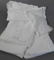 Fine quality bed linen comprising an embroidered single sheet, two plain single sheets and a pair of