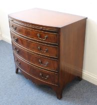 A bow-fronted mahogany bachelor's chest of small proportions and in late 18th century style (20th