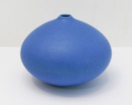 Delan Cookson (1937- 2020) - a studio porcelain vase of squat bun form, matt azure glaze and seal