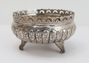 A small continental white metal (marked '800') bowl of circular form: pierced border above a
