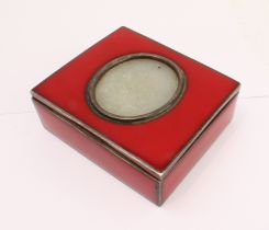 A 19th century white metal and red enamelled box (probably French (the head of Minerva to the