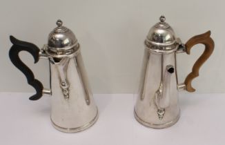 A heavy grade hallmarked silver chocolate pot and matching hot-water pot 18th century style. Each