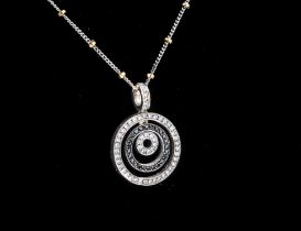 An 18ct white gold and black and white diamond pendant necklace