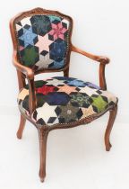 A French style beech wood fauteuil in House of Hackney upholstery: late 20th century, the