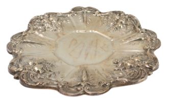 A sterling silver dish by Reed & Barton (mark to underside) of octagonal section and repoussé