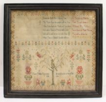 A late 18th century George III period needlework sampler: the upper section with three stanzas of