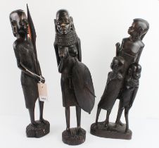 African ebonised hardwood carvings (20th century) to include a mother and child group (45 cm