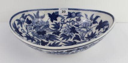 A 19th century Wedgwood boat-shaped bowl: transfer-decorated 'Peony' pattern, raised on conforming