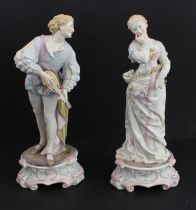 A large pair of 19th century hand-decorated German porcelain figures: male and female in early-style
