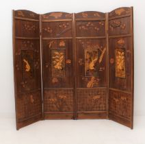 A 19th century three-fold Japanese pine room-screen: the four front panels incised and decorated