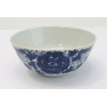 A 19th century Chinese porcelain bowl of pleasing proportions: hand-decorated in cobalt-blue