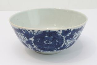 A 19th century Chinese porcelain bowl of pleasing proportions: hand-decorated in cobalt-blue