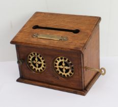 A 19th century oak country house type letterbox with brass plaque marked 'Letters for Post with a