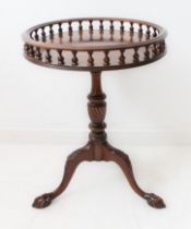 A circular wine or occasional table in 18th century style (a good modern reproduction): the top with