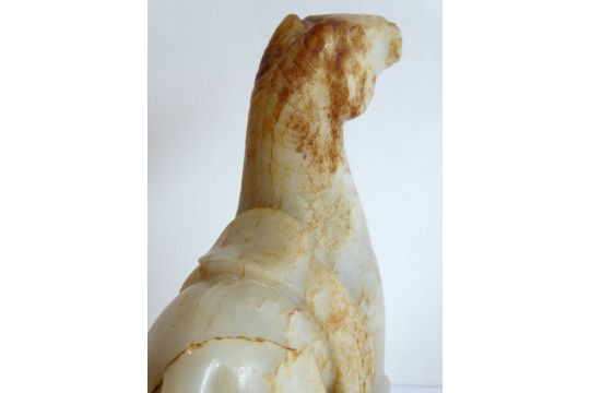 Qing Dynasty (1644-1911) - a large and heavy pale-celadon and russet jade carving of a saddled horse - Image 10 of 25