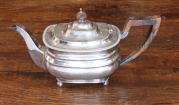 A George V silver teapot - William Hutton & Sons, Sheffield 1934, of bombé rectangular form, with