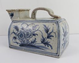 A Chinese late Ming Dynasty (1368-1644) ceramic pissoire (portable chamber pot/urinal): hand-