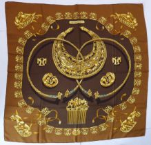 A classic vintage Hermès silk twill scarf: 'Les Cavaliers d'Or' was designed by Vladimir
