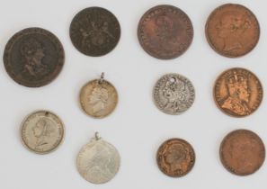 A mixed lot of eleven coins and tokens: 1. Field Marshall Wellington one penny token (3.3 cm), 2.