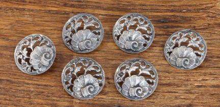 A set of six early 20th century hallmarked silver buttons: each with pierced scrolling foliate