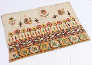 A fragment of late 19th or early 20th century multi-coloured flatweave embroidery (probably